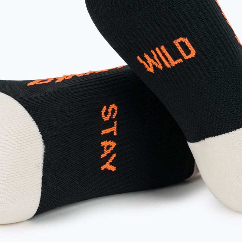 Lyžiarske ponožky DYNAFIT Traverse Mid black out ultra orange/4220 6