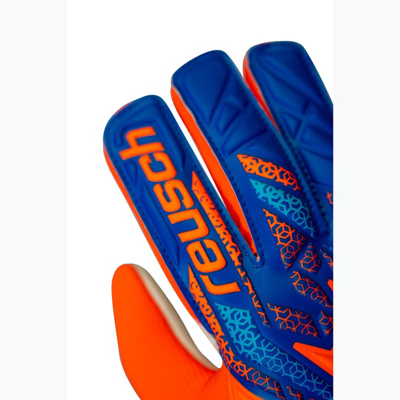 Brankárske rukavice Reusch Attrakt Starter Solid shock orange/blue 5