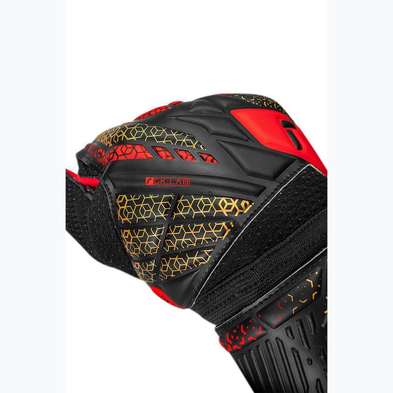 Reusch Attrakt Solid brankárske rukavice black/gold/firery red 6