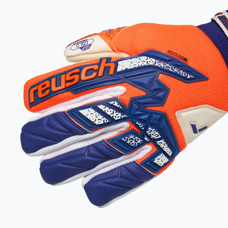 Detské brankárske rukavice Reusch Attrakt Freegel Gold NC Junior oranžová/modrá 6