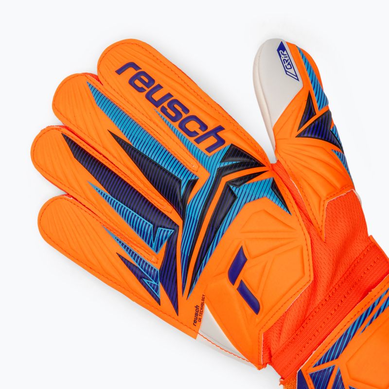 Detské brankárske rukavice Reusch Attrakt Grip Junior shocking orange/blue 4