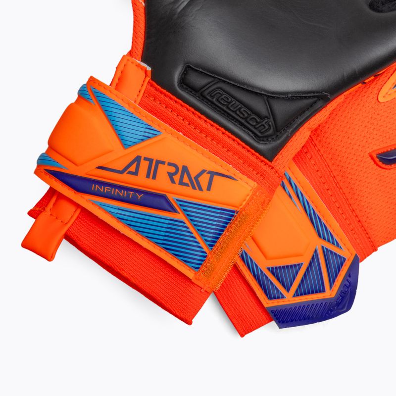 Detské brankárske rukavice Reusch Attrakt Infinity Evolution NC Junior shocking orange/blue/black 5