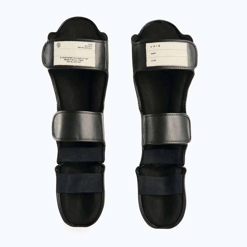 Chrániče holene a chodidla UNIQ UQSG2 technical black 2