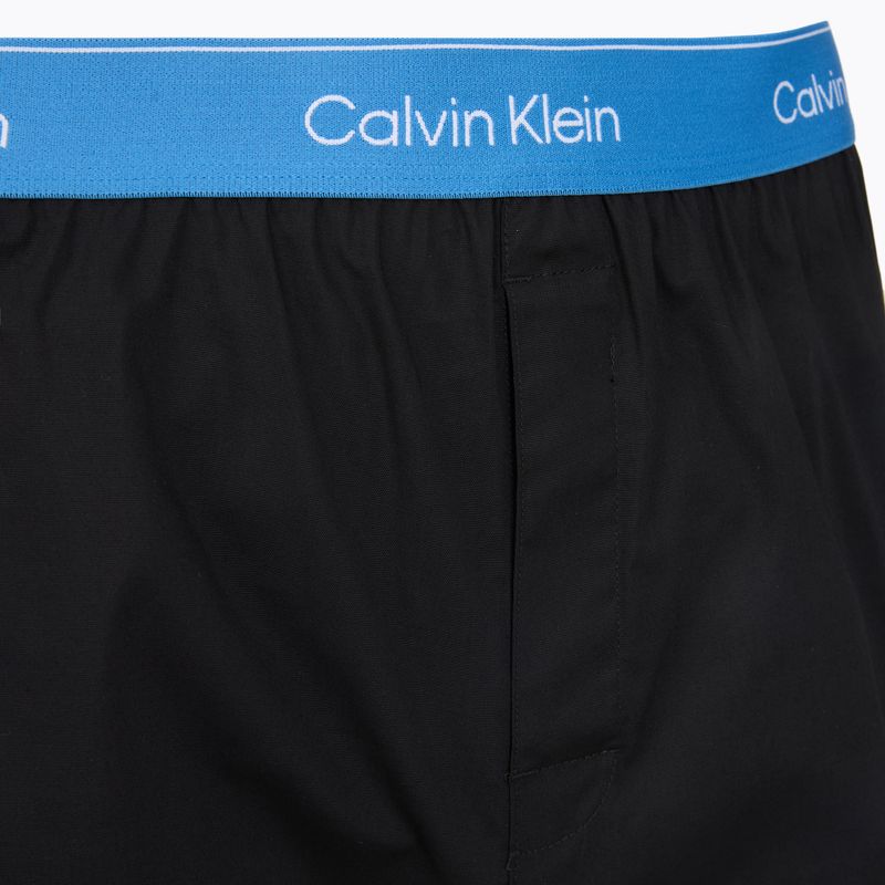 Pánske boxerky Calvin Klein LV00NB4267 Boxer Slim black bodies w/ poseidon blue/plein 6