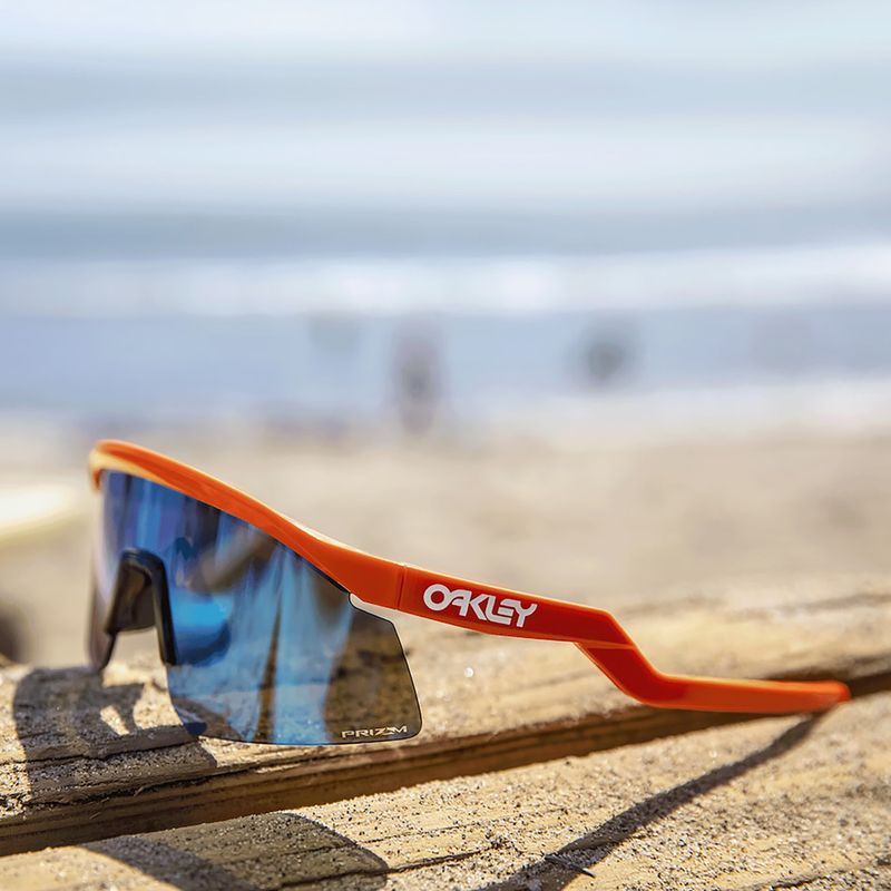 Slnečné okuliare Oakley Hydra neónovo oranžové/prismové zafírové 11