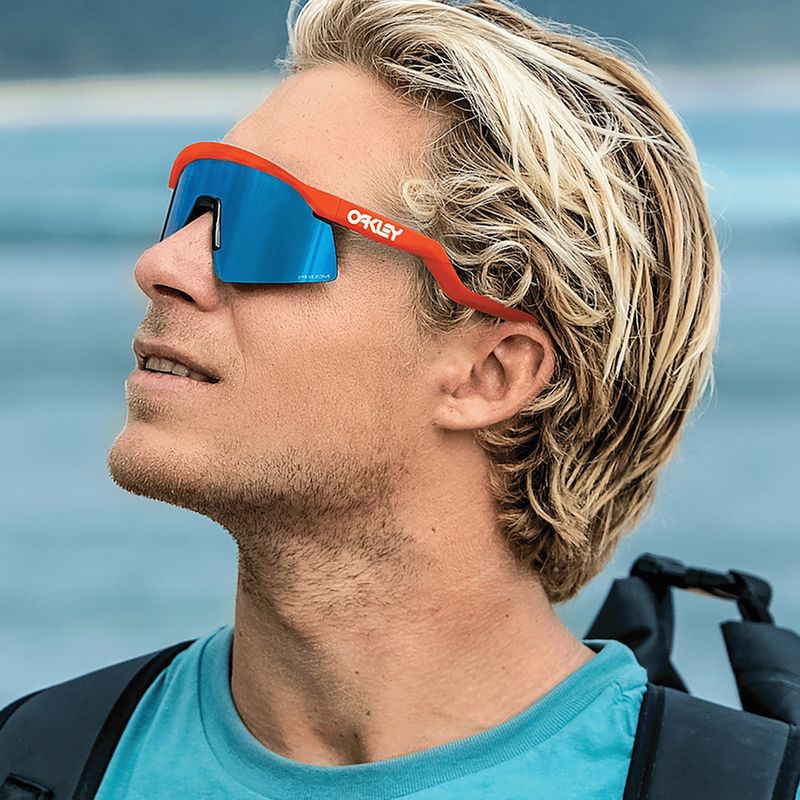 Slnečné okuliare Oakley Hydra neónovo oranžové/prismové zafírové 12