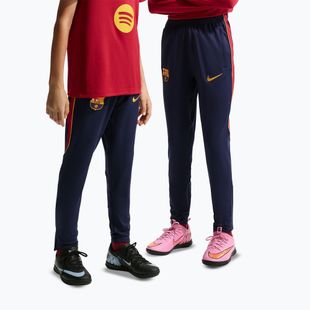 Detské futbalové nohavice Nike FC Barcelona Strike Dri-Fit blackened blue/noble red/yellow