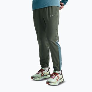 Pánske bežecké nohavice Nike Miler Dri-Fit Woven camo green/mineral slate