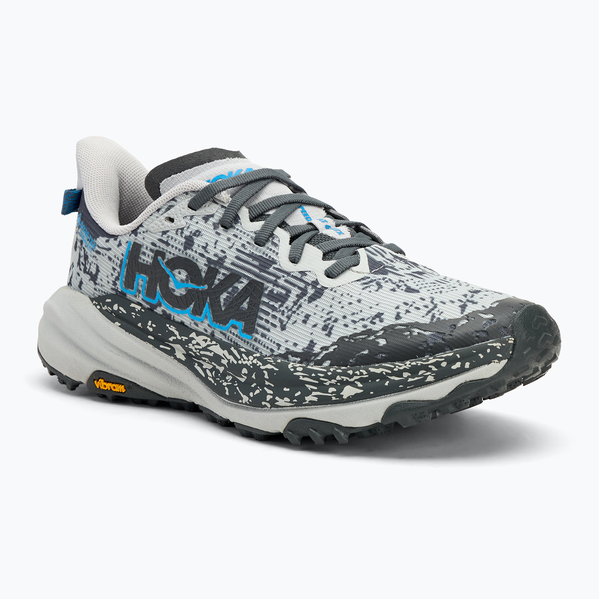 Pánska bežecká obuv Hoka Speedgoat 6 GTX stardust/outer orbit (Speedgoat 6 GTX 1155150-SSTT)