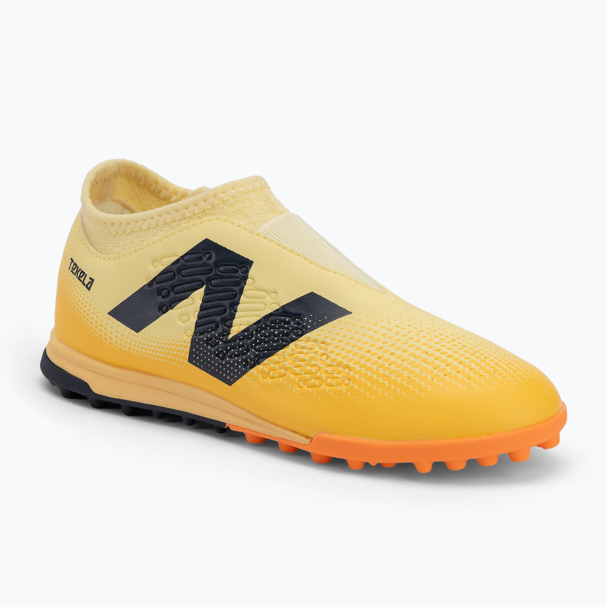 Detské kopačky New Balance Tekela Magique V4+ Jr TF beige (Tekela Magique V4+ Jr TF SJT3TJ45.M.045)