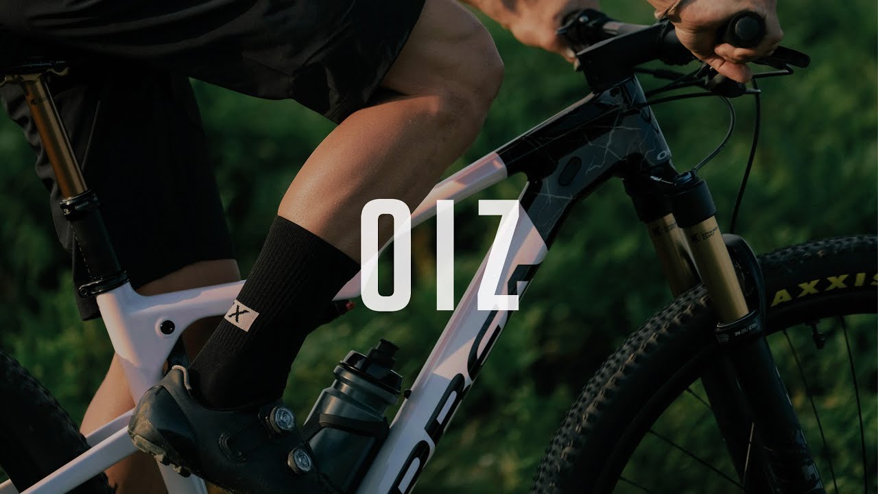 Horský bicykel Orbea Oiz M11 AXS oranžový/čierny M23719LE